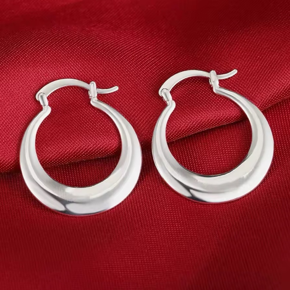 Silver Crescent Hoop Earrings with Tapered Design